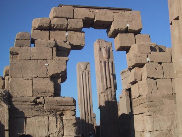 Papyrus and lotus through arch, Karnak